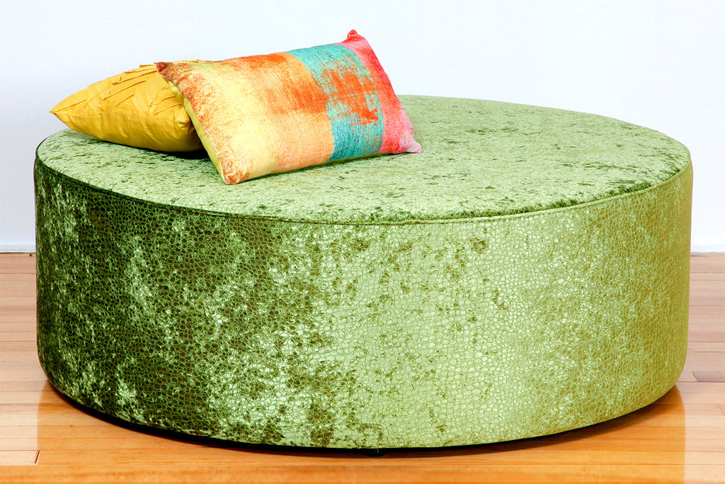 Oreo Large Round Ottoman upholstered in green velvet