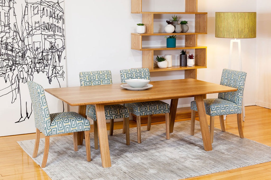 Trestle Solid American Oak Timber Dining Table featured with American Oak Shelving Unit and Marrimeko Wall Art