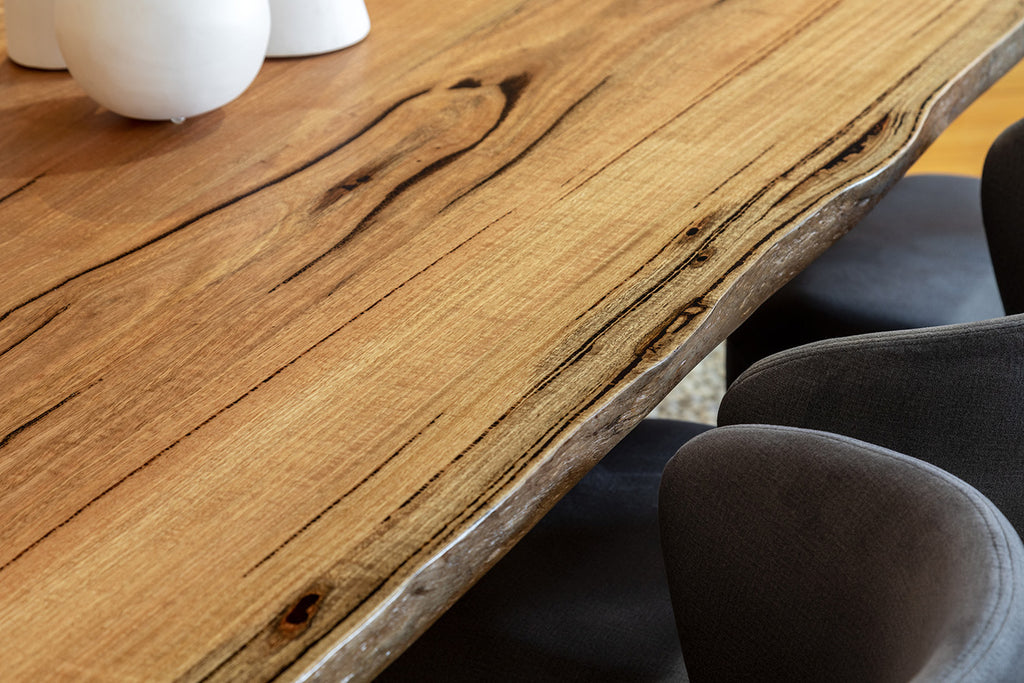 Axis solid Marri dining table natural edge detail