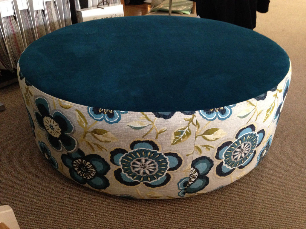 Oreo Large Round Ottoman upholstered in blue floral fabric
