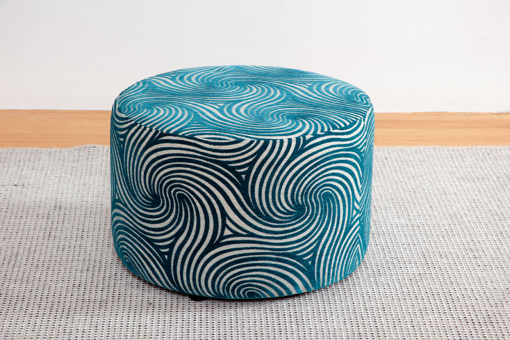 Oreo Large Round Ottoman upholstered in blue swirls
