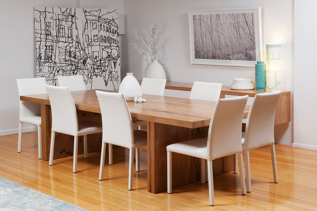 The "Edge" Solid Marri Dining Table and Italian white leather dining chairs