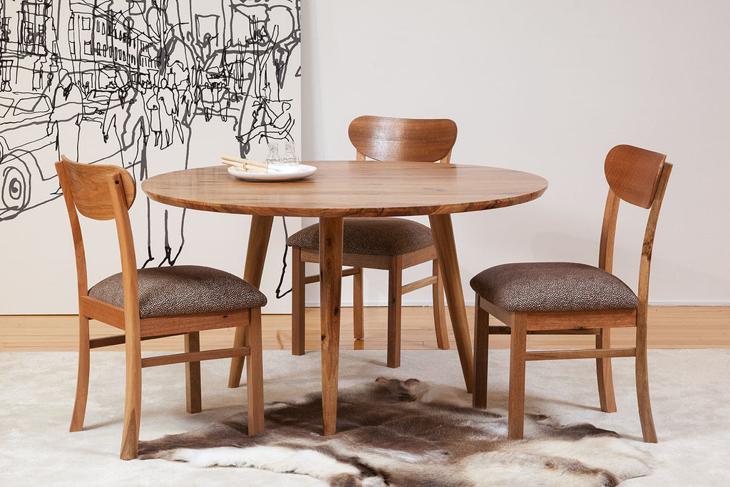 Oslo Marri Dining Suite with dining chairs, features a round dining table